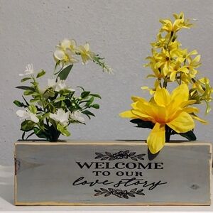 Yellow and White Floral Welcome Sign